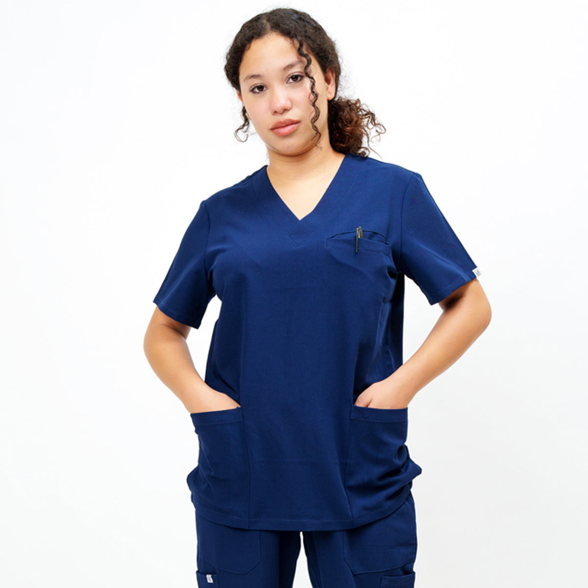 Women's V-Neck Double Pocket Top in Madagascar Saphire Navy