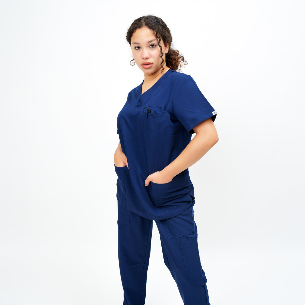 Women's V-Neck Double Pocket Top in Madagascar Saphire Navy