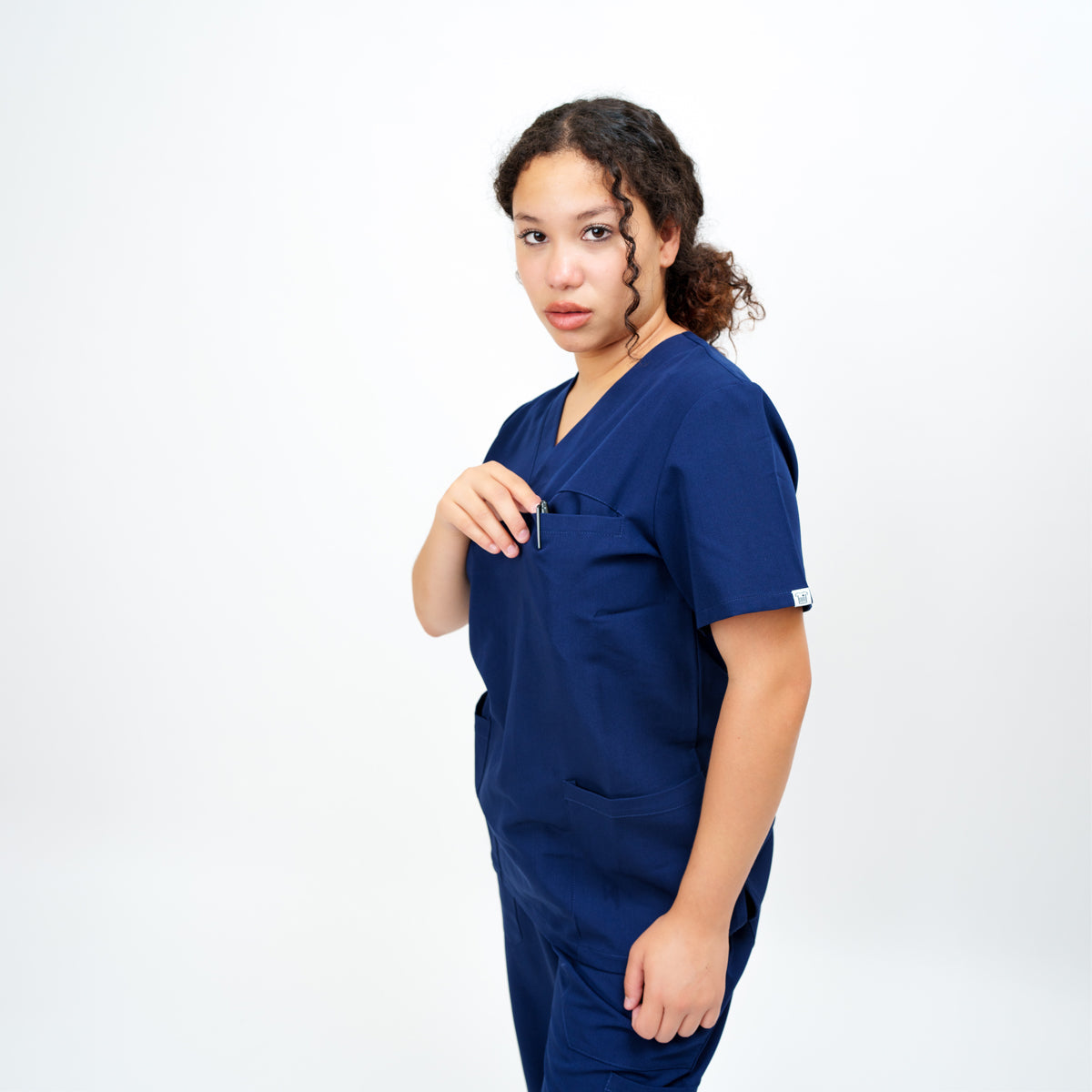 Women's V-Neck Double Pocket Top in Madagascar Saphire Navy