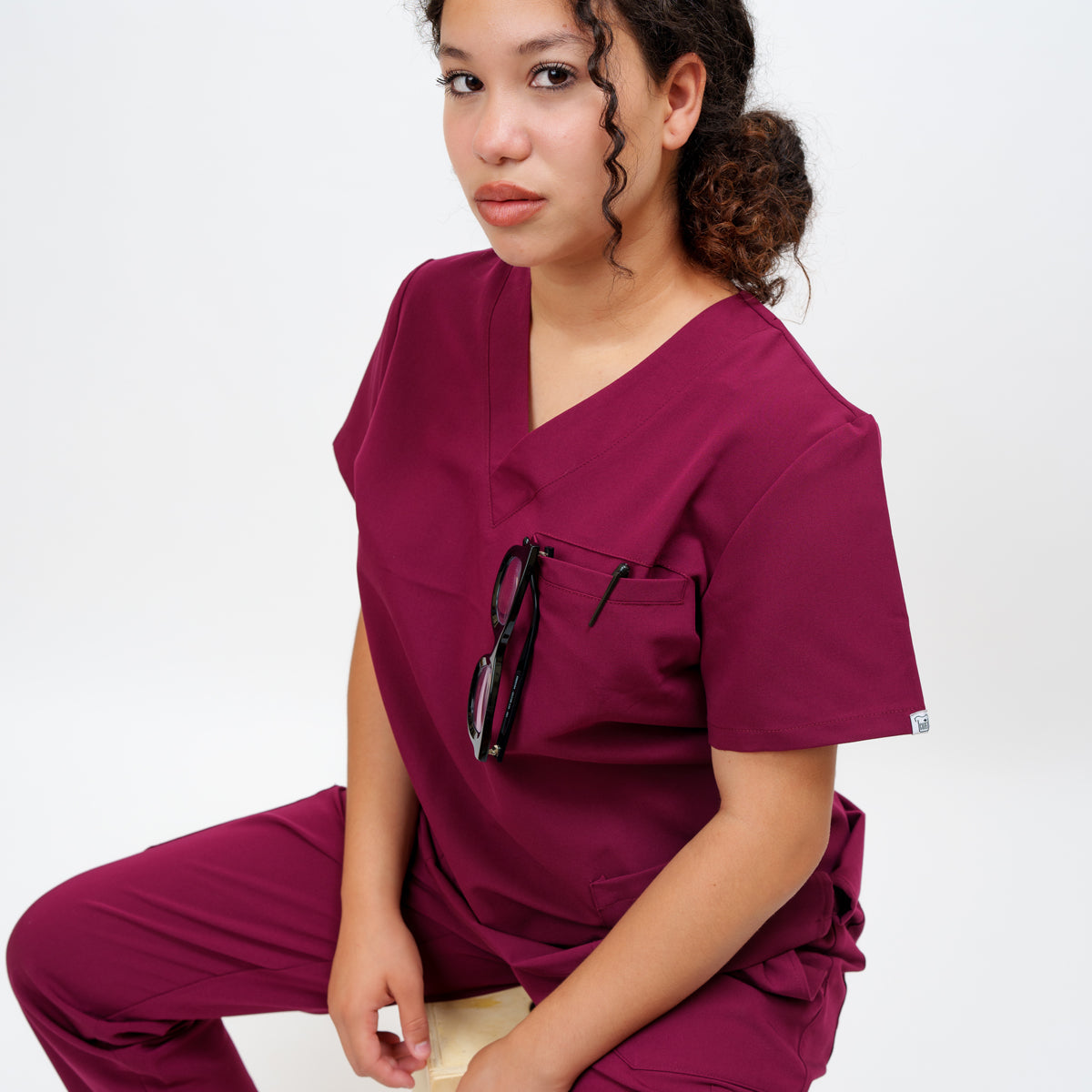 Women's V-Neck Double Pocket Top in Firebrick Red